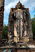 Thailand - Old Sukhothai - Wat Saphan Hin. The Buddha statue is in the Abhaya mudra, the gesture of dispelling fear. 